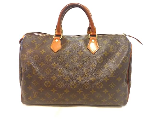 Louis Vuitton Speedy 35 Monogram - SA824

Speedy 35 Monogram - SA824 Marrom Couro  ref.1366271