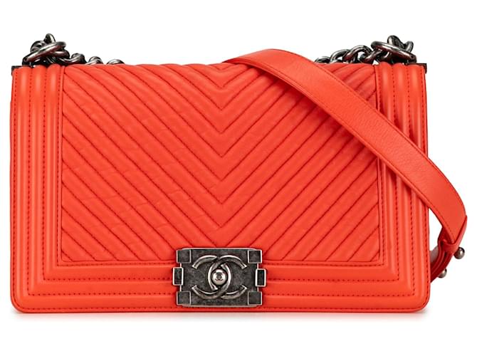 Le Boy Chanel Bolsas Laranja Couro  ref.1367130