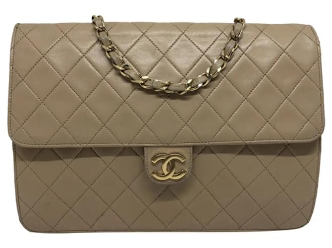Timeless Chanel Bolsas Bege Couro  ref.1368045