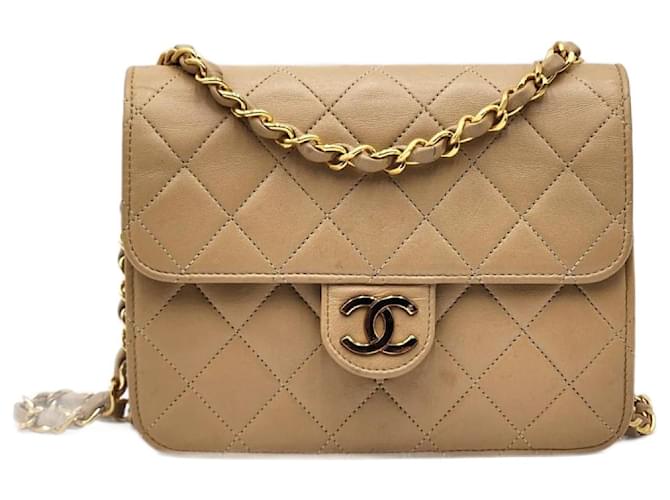 Bolsa Chanel Timeless Classic Mini Flap Bege Couro  ref.1369834