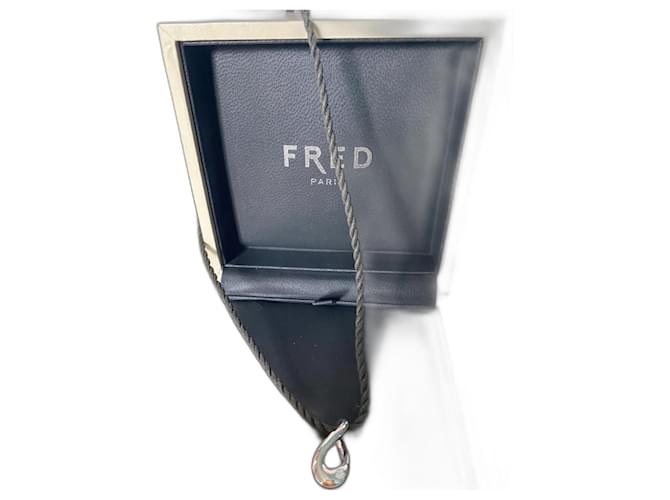 Authentic pendant with a moving diamond and black and gray gold braid from Maison Fred. Silvery White gold  ref.1372977