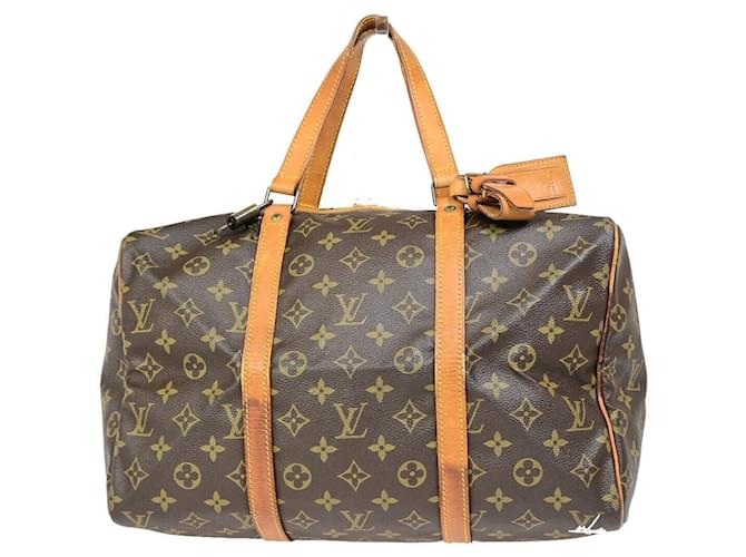 Louis Vuitton Sac souple Braun Leinwand  ref.1374727