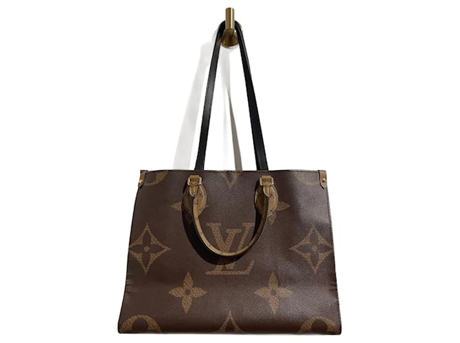 Onthego LOUIS VUITTON  Handbags T.  Cloth Brown  ref.1376675