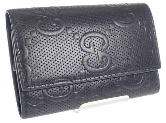 Estuche para llaves de cuero en relieve Gucci Porta llaves de cuero 625565 1W3AN 1000 en buen estado  ref.1376856