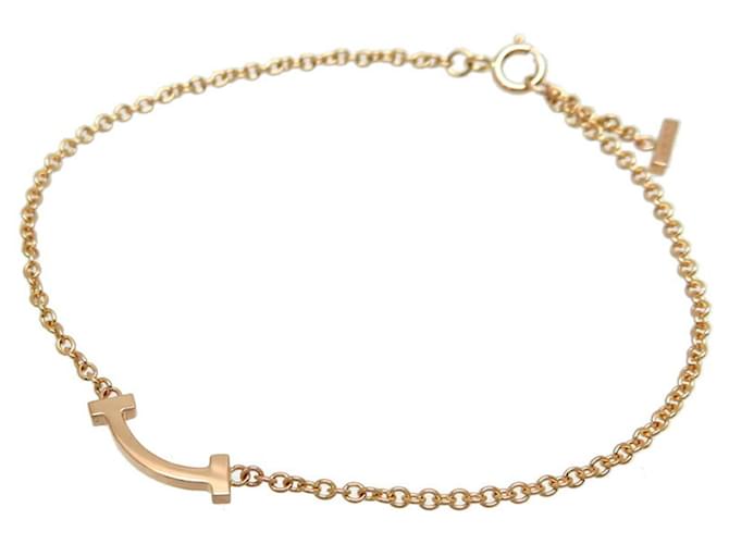 Tiffany & Co T Dourado Ouro rosa  ref.1379411