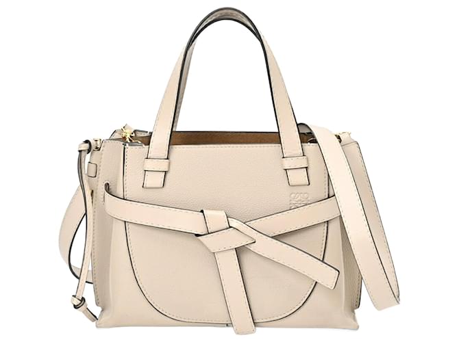 Manija superior de puerta Loewe Beige Cuero  ref.1379440