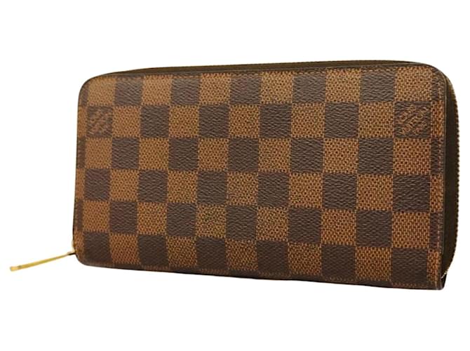 Louis Vuitton Portefeuille zippy Brown Cloth  ref.1379991