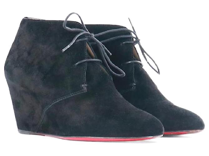 Botas CHRISTIAN LOUBOUTIN T.EU 38 Couro Preto  ref.1380048