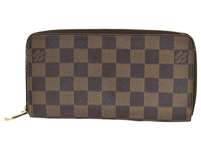 Louis Vuitton Portefeuille zippy Brown Cloth  ref.1384427