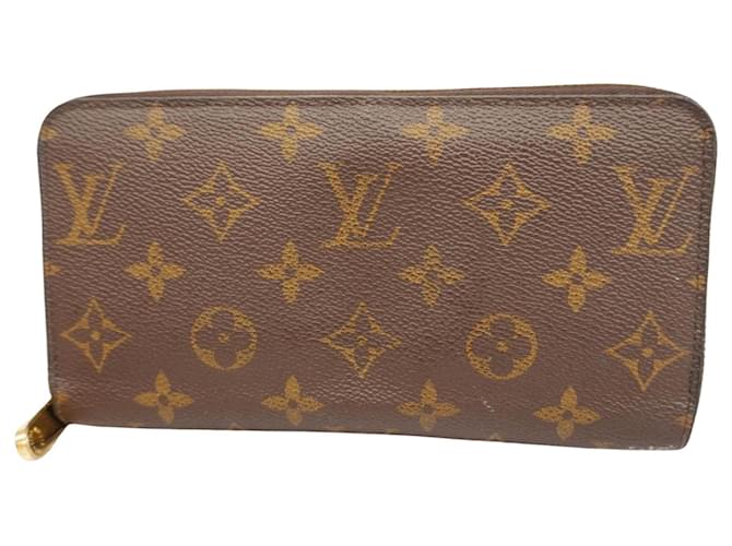 Louis Vuitton Portefeuille zippy Brown Cloth  ref.1385390