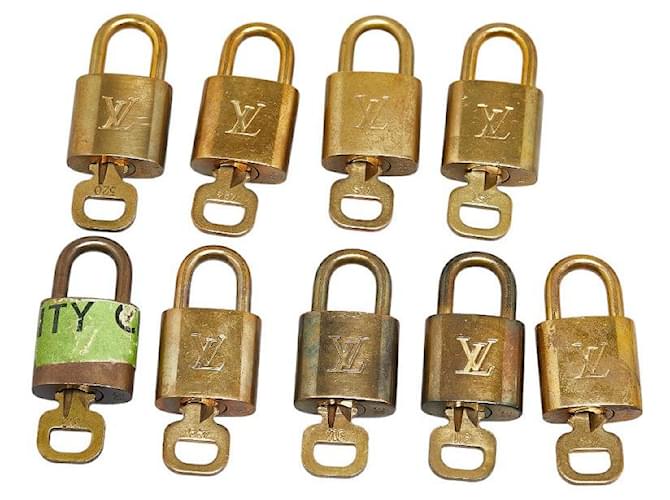 Set di chiavi per lucchetto Louis Vuitton in metallo altro in buone condizioni  ref.1386300