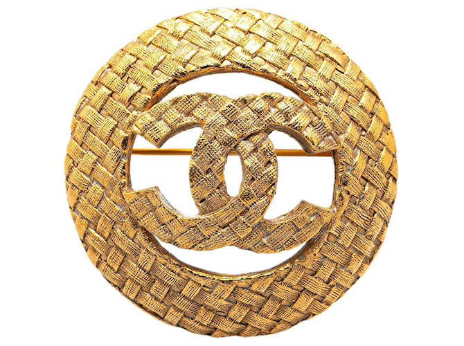 Broche Chanel CC dorée Métal  ref.1388499