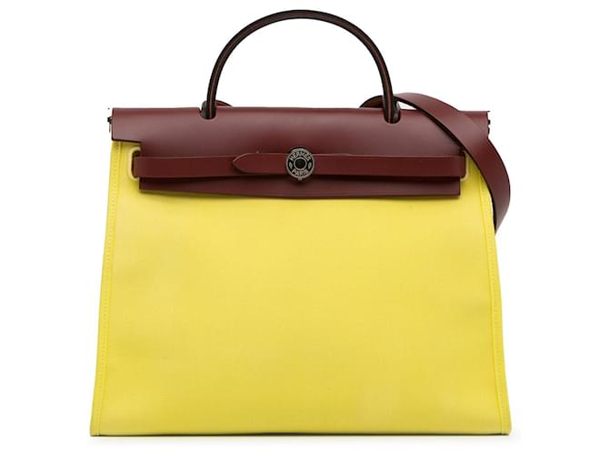 Bolso satchel Hermès Toile Herbag con cremallera 31 amarillo Cuero  ref.1389500