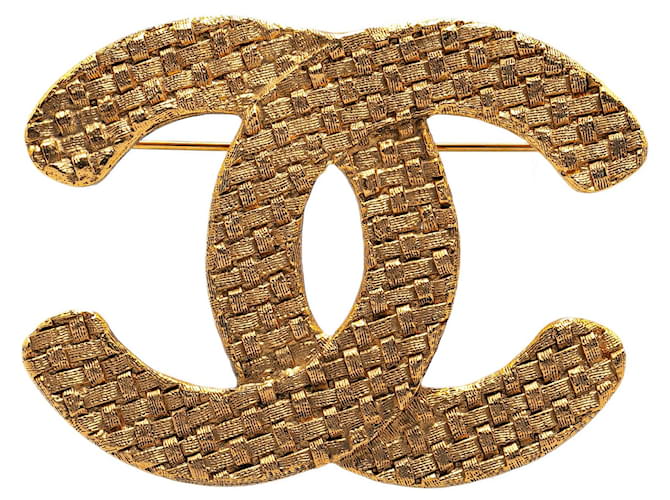 Broche plaquée or Chanel CC dorée Métal  ref.1390172