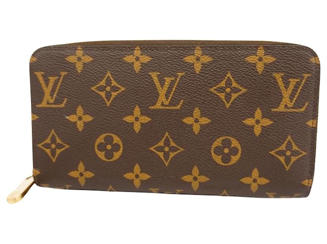 Louis Vuitton Portefeuille zippy Brown Cloth  ref.1390843