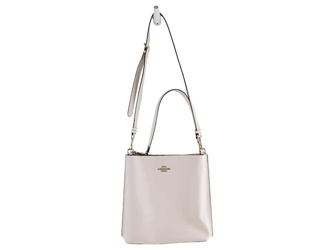 Coach Este bolso bandolera presenta un cuerpo de cuero. Beige  ref.1391510