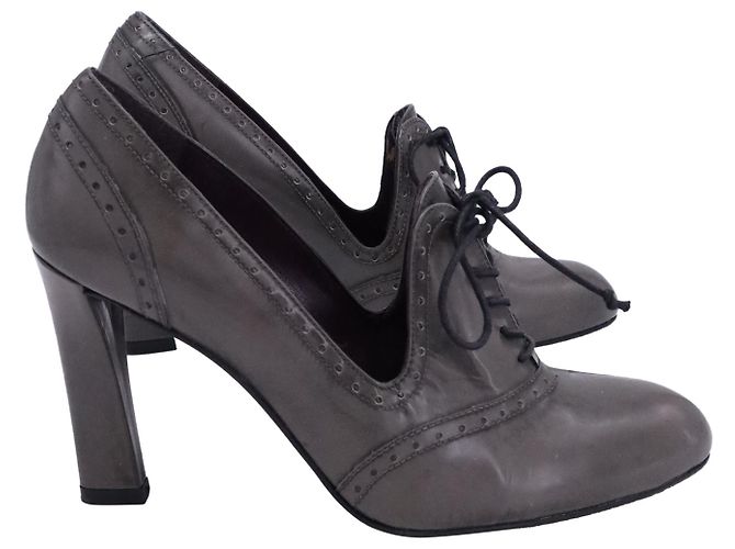 Stuart Weitzman Lace-Up Wingtip Pumps in Grey Leather