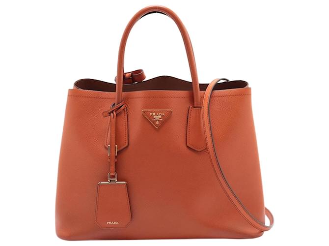 Prada Bolsa de 2 vias em couro Saffiano laranja  ref.1394521