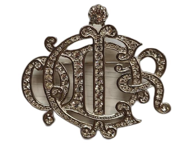 Broche de monograma prateado da Christian Dior com cristais. Prata Metal  ref.1394417