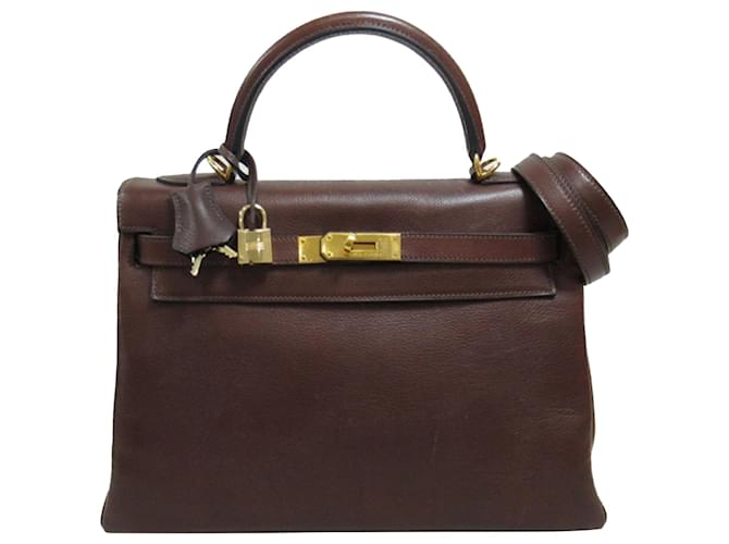 Hermès Brown Gulliver Kelly Retourne 32 Marrone Marrone scuro Pelle Vitello simile a un vitello  ref.1394590