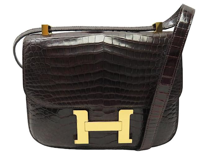 Hermès VINTAGE HERMES CONSTANCE 22 HANDBAG IN CROCODILE LEATHER CROSSBODY HAND BAG Brown Exotic leather  ref.1394675