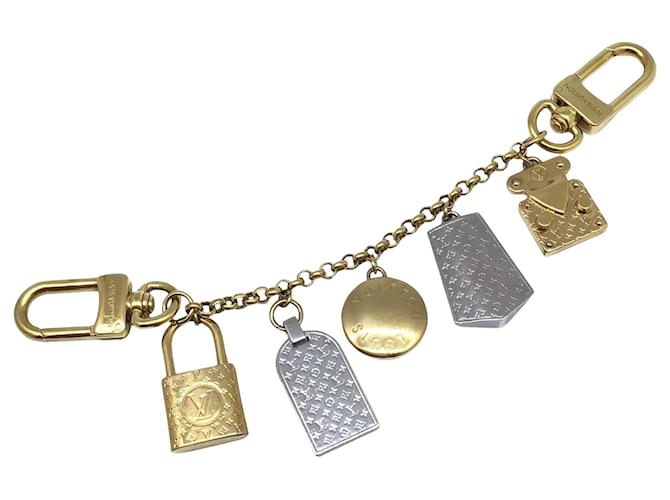 Nanograma Louis Vuitton Dourado Metal  ref.1395512