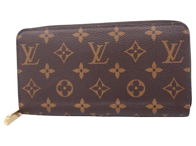 Louis Vuitton Portefeuille zippy Brown Cloth  ref.1397772