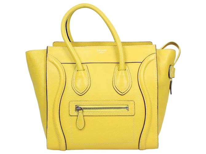 Luggage Céline Sac à main micro bagage en cuir tambouriné CELINE en citron Jaune  ref.1408491