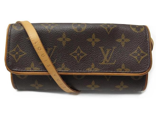 LOUIS VUITTON TWIN BELT CLUTCH BAG IN MONOGRAM CANVAS M51852 POUCH Brown Cloth  ref.1409066