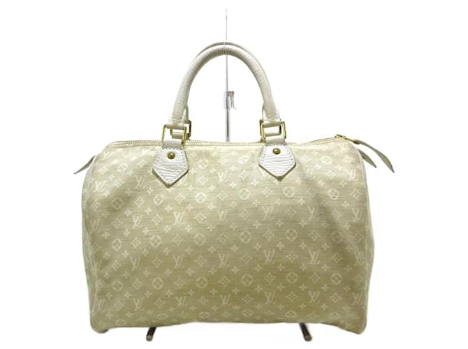 Louis Vuitton I'm sorry, I didn't understand your request. How can I assist you today? Cotton  ref.1409355