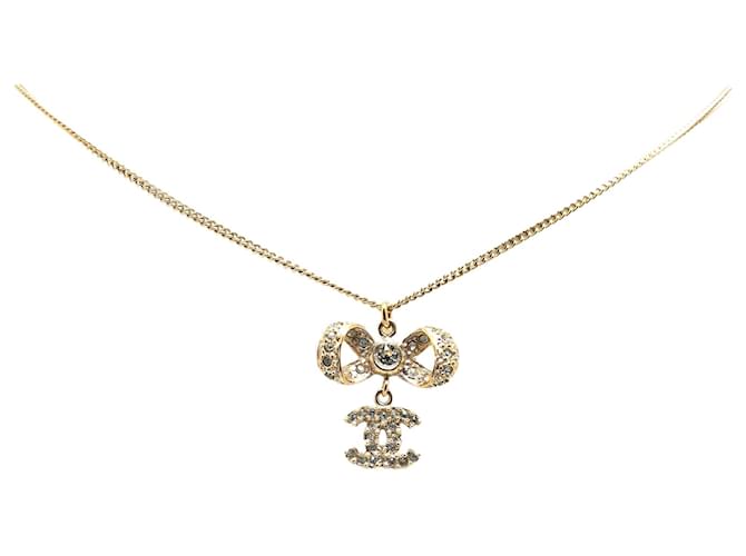 Gold Chanel Gold Plated CC Bow Crystal Pendant Necklace Golden  ref.1415855