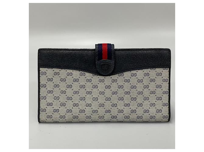 Carteira Continental Microguccissima da Gucci em couro em muito bom estado  ref.1416527