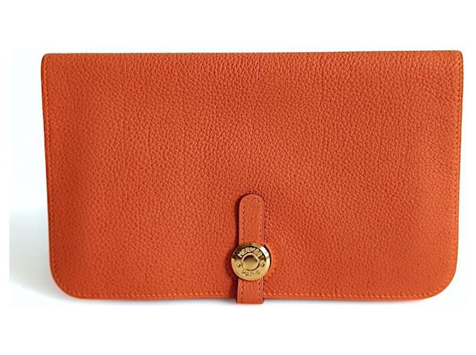 Portefeuille Hermès Dogon en cuir Orange Clémence 2003  ref.1417038