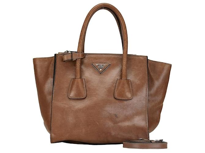 Prada Lederhandtasche mit Dreiecks-Logo-Platte in gutem Zustand Braun  ref.1419529