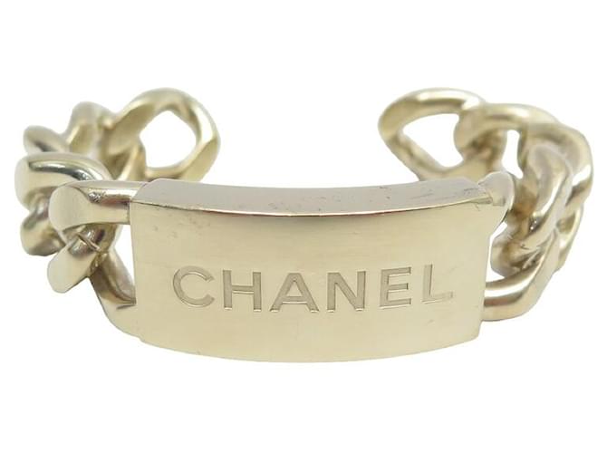 BRACELET CHANEL MANCHETTE JONC CHAINE GOURMETTE LOGO EN METAL DORE BANGLE Métal Doré  ref.1419835