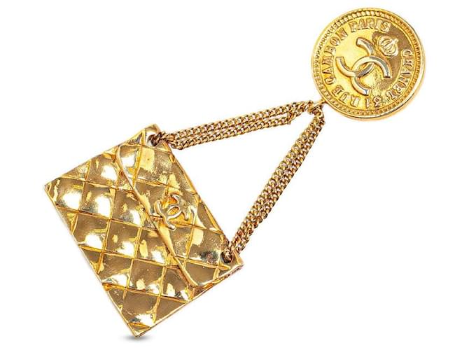 Broche Swing Coco Mark Vintage da Chanel Banho de Ouro em Muito Bom Estado Dourado Metal  ref.1419974