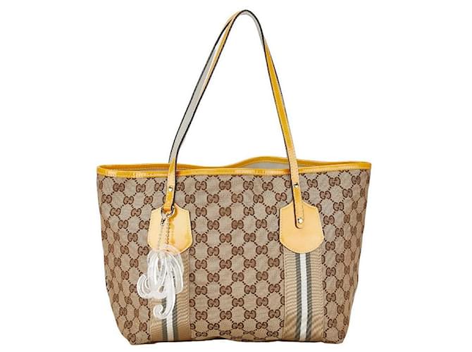 Gucci GG Canvas Jolly Handbag 211971 in Beige and Yellow Patent Leather in Very Good Condition Cloth  ref.1420032