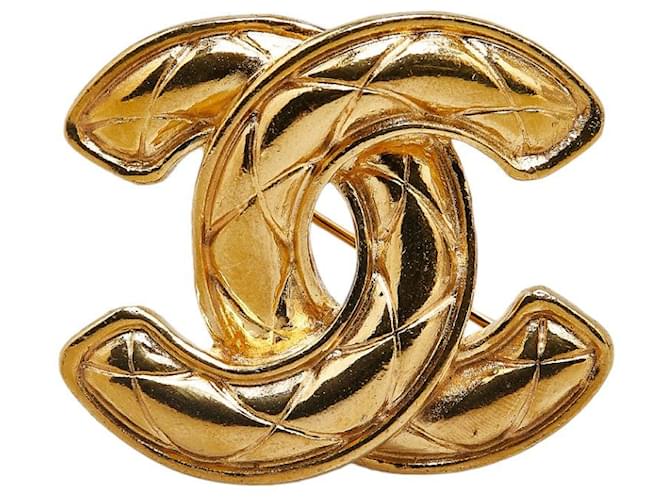 Chanel Matelassé Coco Mark Brosche Vergoldet in Großartigem Zustand Golden Metall  ref.1421538