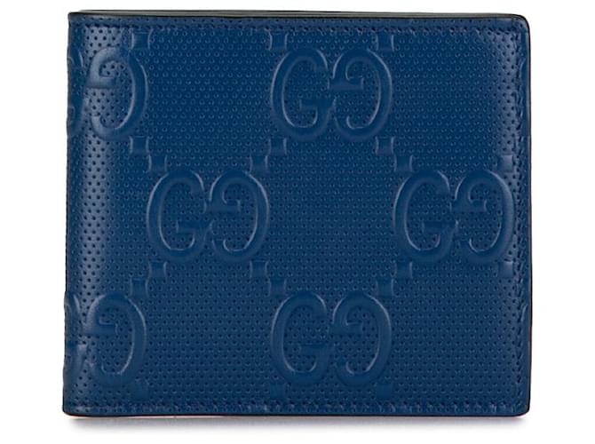 Portefeuille bifold en cuir Gucci GG embossé 625555 en très bon état Noir  ref.1421547