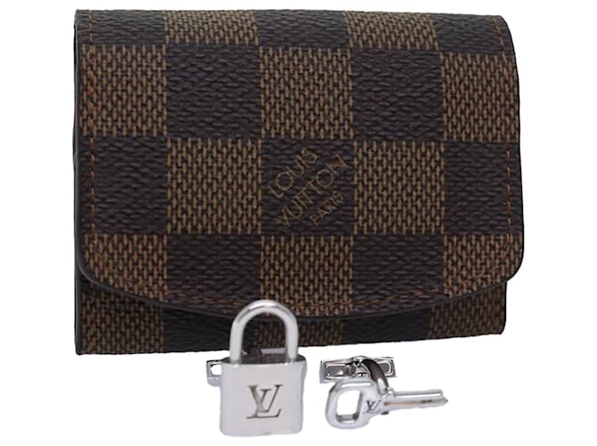 LOUIS VUITTON Étui à poignets Damier Ebene M30964 LV Auth 76884  ref.1421874