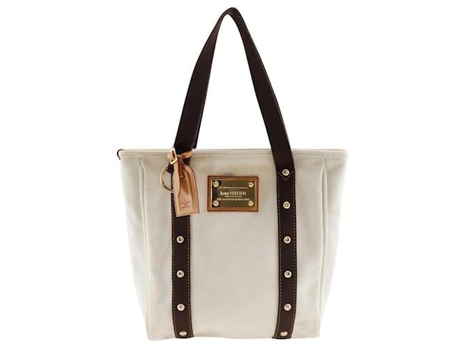 Sac tote en toile Louis Vuitton Antigua Cabas MM M40036 en bon état Blanc  ref.1422105