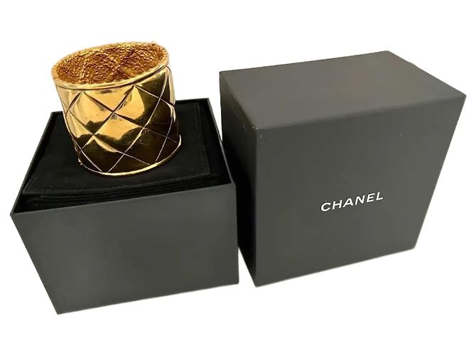 Bracelete Chanel dourado de aço