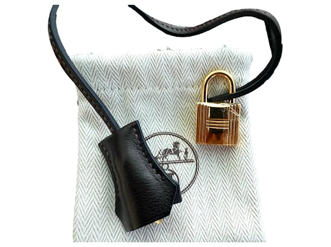 campanella, linguetta, lucchetto nuovo Hermès per borsa Kelly o Birkin Marrone Marrone scuro 