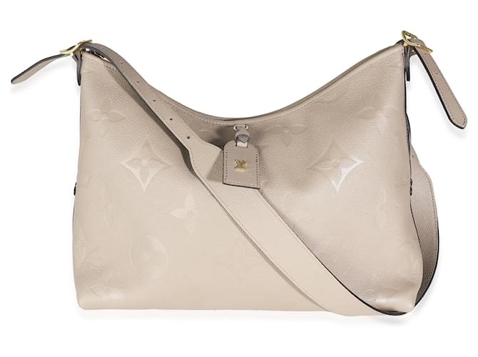 Bolso Louis Vuitton Monogram Empreinte CarryAll MM en color Turtledove Gris Cuero  ref.1423304