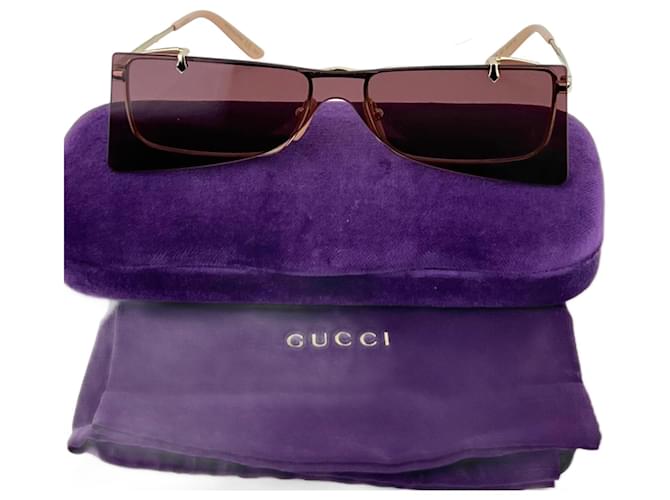 Lunettes de soleil Gucci Flip-Up Rectangle Rouge Cadres Dorés GG0363S 002 56 d'occasion  ref.1424250