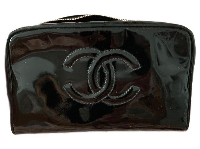 Medaillon Chanel Monederos, carteras, estuches Negro