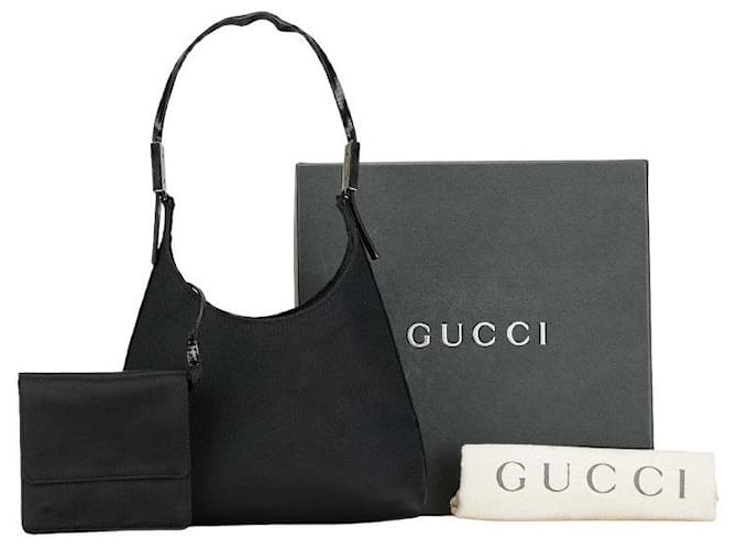 Bolsa de mão mini de nylon e couro Gucci preta em muito bom estado Preto Lona  ref.1429111