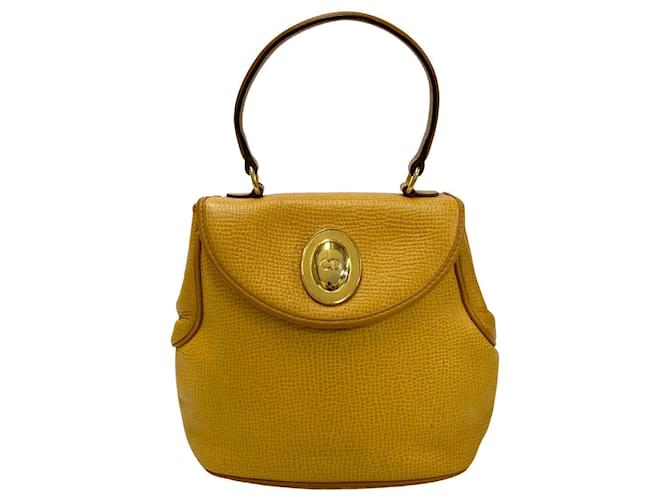 Bolsa de couro com logo CD da Dior Bolsa de couro em muito bom estado Amarelo  ref.1432584