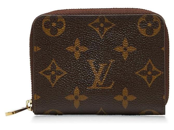 Porte-monnaie Zippy Monogram Louis Vuitton M60067 en cuir PVC marron en excellent état Plastique  ref.1435540