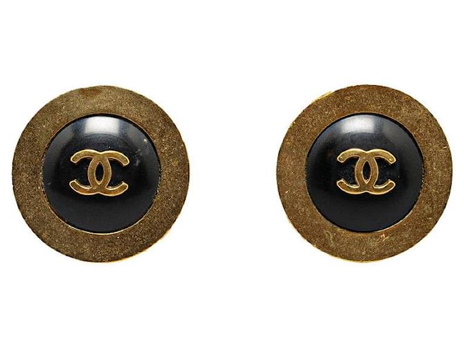 Boucles d'oreilles vintage Chanel motif bouton Coco en noir et or en très bon état Métal  ref.1437440